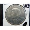 Image 1 : ten dollar coin from Liberia commemorating the life of john f Kennedy jr