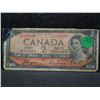 Image 3 : series of 1954 two dollar canadian bank note with the devil's face.  This was an error in printing. 