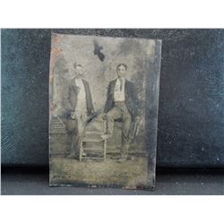 vintage tin print with two men