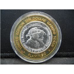 Flamingo Las Vegas $10 (.999) silver gambling token—55th Anniversary.   In capsule.