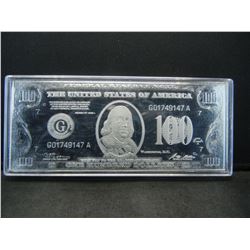 $100 Foil note. .8 ounces weight.