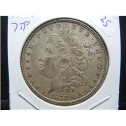 1878 Seven Tail Feather Morgan Dollar.  AU 53.