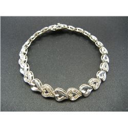 Ladies Bracelet-seven Inch sterling with marcasite link hearts.