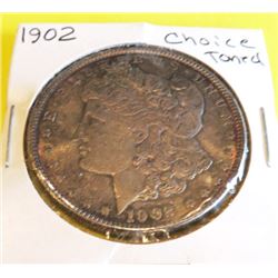 1902 CH AU Toned Morgan Silver Dollar