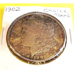 1902 CH AU Toned Morgan Silver Dollar