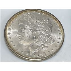 1885 o Toned Rim BU Grade Morgan Dollar