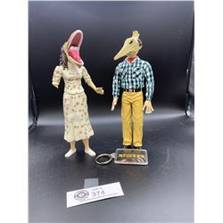 Pair of Beetlejuice Figures. Lady is Missing Part of Her Arm