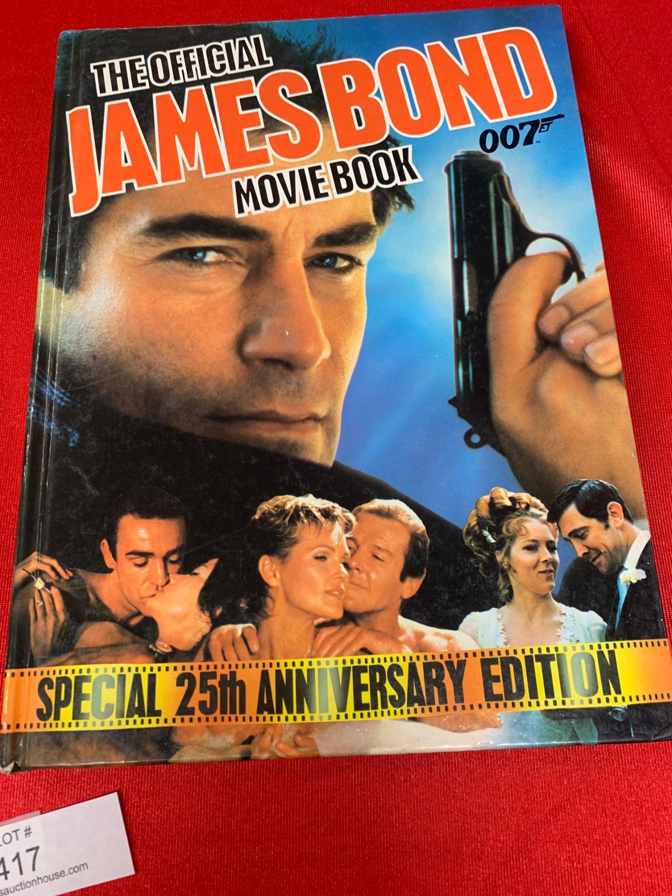 Official James Bond Movie Book Plus a Hard Cover Now Showing
