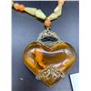 Image 2 : Nice Vintage Stone Necklace with Pendant That Has an Insect In it, in Resin