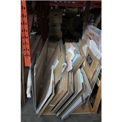 LARGE LOT OF ARTWORK UNDERNEATH PALLET RACKING