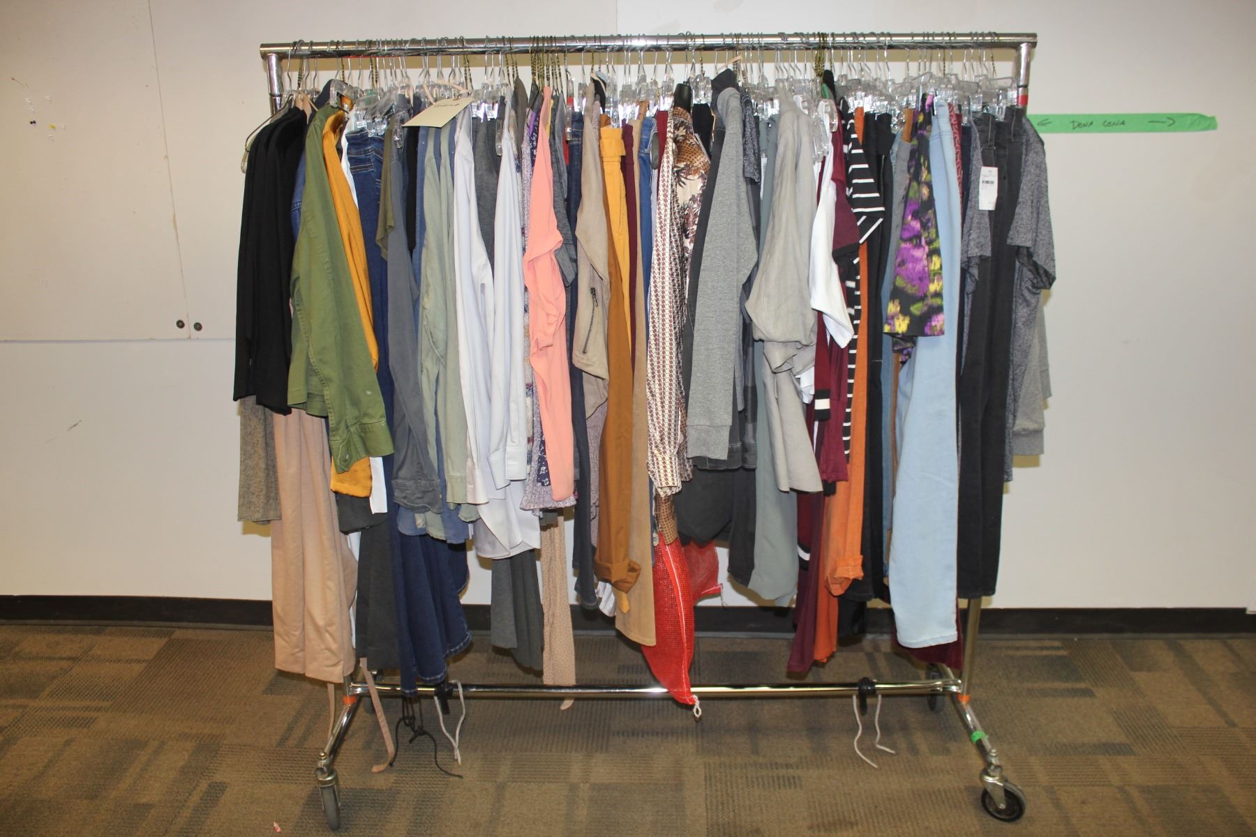 ROLLING RACK OF COSTUMES AND CLOTHING, RACK NOT INCLUDED