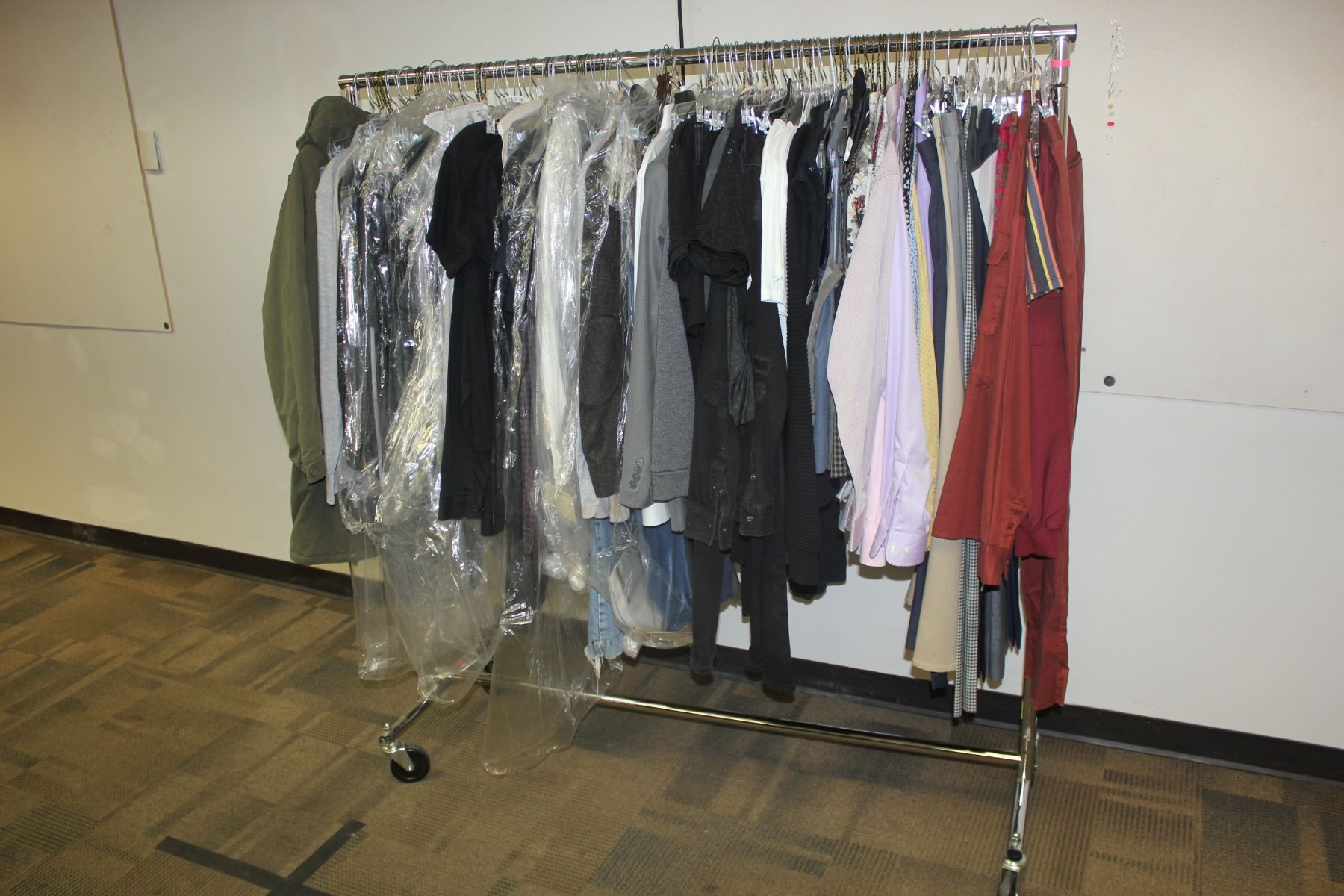 ROLLING RACK OF COSTUMES AND CLOTHING, RACK NOT INCLUDED