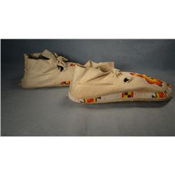 Sioux split hide moccasins, partially beaded, Pine Ridge Reservation, S. Dak