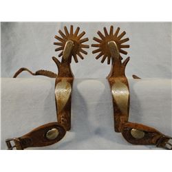 Crockett double silver mtd leaf spurs, inside band marked, wagon wheel spoked rowels. Nice spurs.