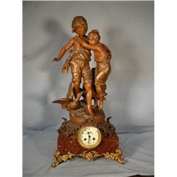 Aug Moreau French figural clock, 24 " h, boy and girl with goose, hand painted clock face