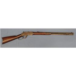 Win. 1873 rifle, .22 short, 24" oct bbl, some blue on barrel, stock has few hand carved marks on lef