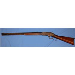 Win. 1873 rifle, .38-40, s#246100B, made 1888, 24" rd. bbl, dark bore, good wood, some pitting, buck