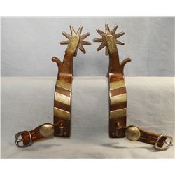 Don Ricardo silver mtd marked spurs, nice; and Buermann Hercules Bronze buffalo head spurs (repaired
