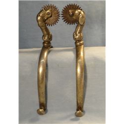 Pair of dog head spurs, unusual