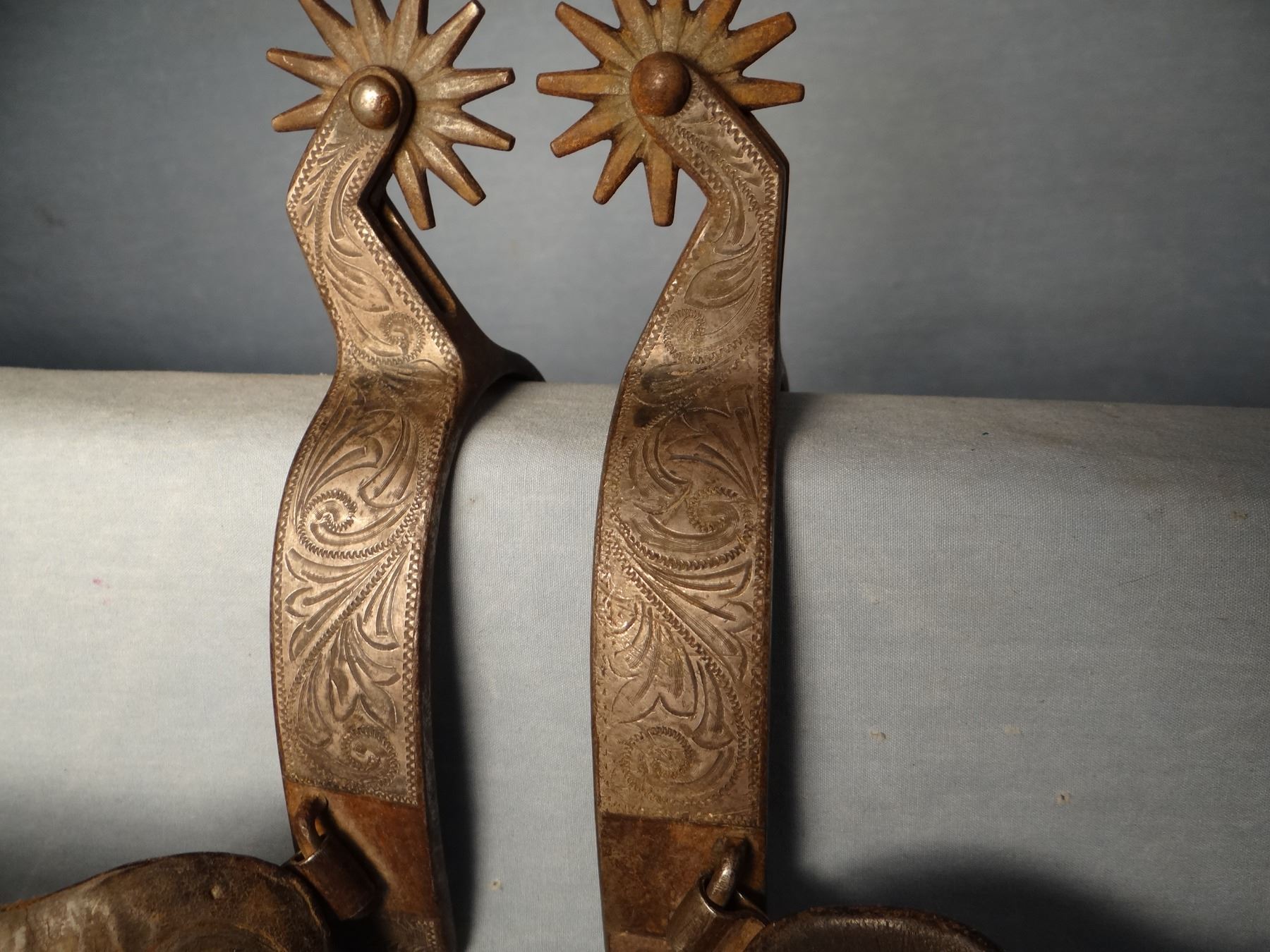 Inlaid sterling silver fancy engraved spurs, 12 pt. rowels