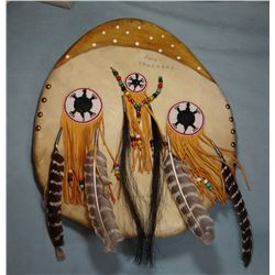 Blackfeet shield -two feathers, 17" w