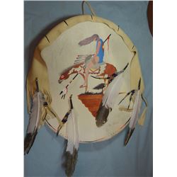 Crow rawhide shield, I. Lion Shows, 30" w