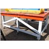 Image 1 : ORANGE WORK TABLE ON CASTORS