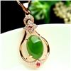 Image 2 : Beautiful Carved Jade Stone Surrounded in Semi-Precious