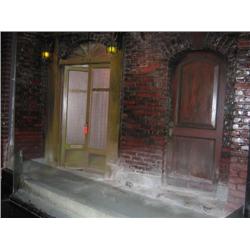 Set/scene Palm wood Apartments on door 