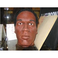O.J. SIMPSON wax head. Includes colored photos of OJ Si