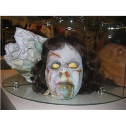 Wax head of possessed girl from the mov