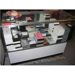 Glass display cabinet with VHS cassette