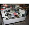 Image 1 : Glass display cabinet with VHS cassette