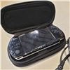 Image 3 : PSP CONSOLE AND 2 PAIRS OF SKULLCANDY HEADPHONES