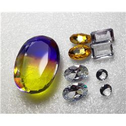 22)  LOT OF 9 LAB CREATED GEMSTONES