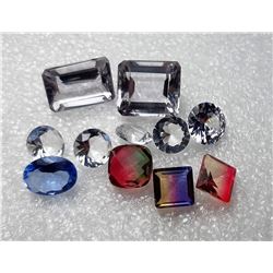 23)  LOT OF 11 LAB CREATED GEMSTONES