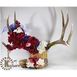 DECORATIVE FLOWER COVERED ANTLER PIECE