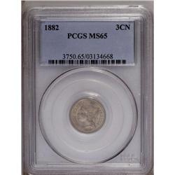 1882 3CN MS65 PCGS. Lovely honey and rose hues embrace