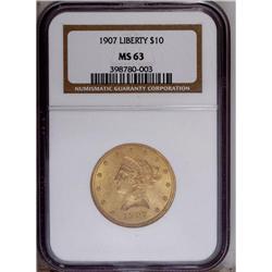 1907 $10 MS63 NGC. Apricot and olive tints adorn this