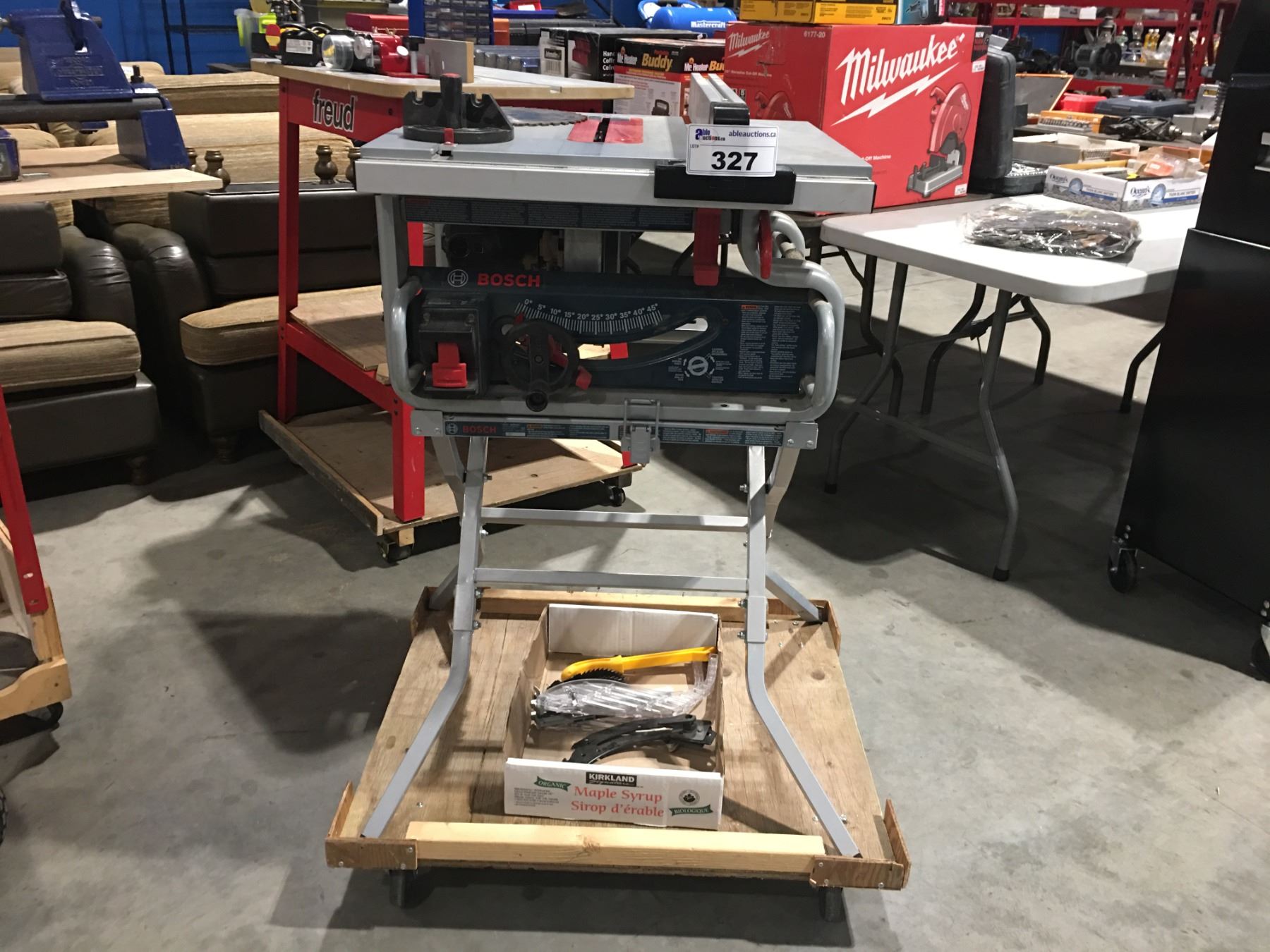 BOSCH PORTABLE TABLESAW ON STAND WITH WHEELS & ADDITIONAL MISC BLADES BOSCH PORTABLE TABLESAW ON STAND WITH WHEELS & ADDITIONAL MISC BLADES
