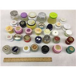 LARGE LOT OF AVON JARS MOST ARE EMPTY