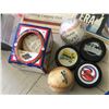 Image 2 : SPORTS RELATED LOT PUCKS BASEBALLS ETC