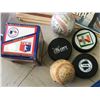 Image 3 : SPORTS RELATED LOT PUCKS BASEBALLS ETC
