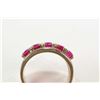 Image 2 : Ladies 10kt yellow gold ring set with five round synthetic ruby gemstones, size 5.5