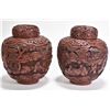 Image 2 : A pair of Oriental cinnabar ginger jars with figural carved court yards scenes, each 6 1/2" in heigh