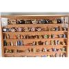 Image 2 : Two wooden displays containing a large selection of Wade pottery figures including animals, insects,