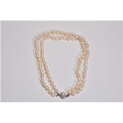 Double strand of Japanese cultured saltwater Akoya pearl, individually knotted and with an 800 silve