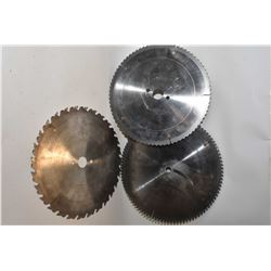 Three used 12  circular saw blades