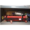 Image 3 : Selection of automotive tools including floor jack, battery charger, two jack stands and a trouble l