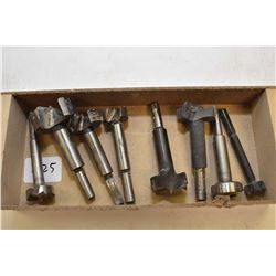 Eight used Forstner bits in assorted sizes